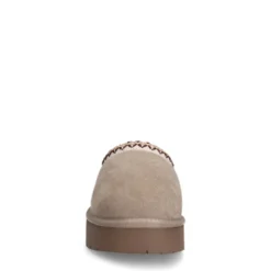 Beige suède instappers met wol