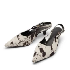 Cow print slingback pumps