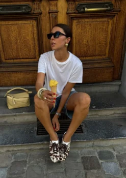 Cow print sneakers met roze en bruine veters
