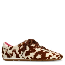 Cow print sneakers met roze en bruine veters