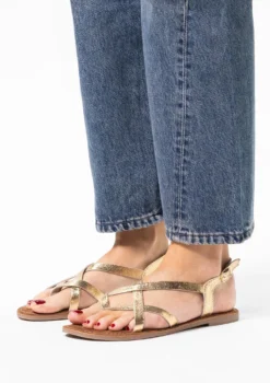 Gouden leren sandalen met gekruiste bandjes