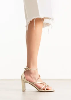 Gouden sandalen met hak