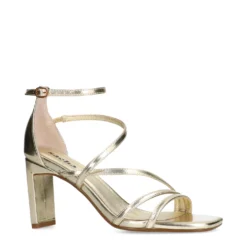 Gouden sandalen met hak
