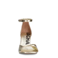Gouden sandalen met hak
