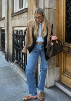 Leopard slip on loafers met goudkleurige chain