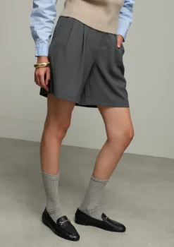 Zwarte leren loafers met goudkleurige chain