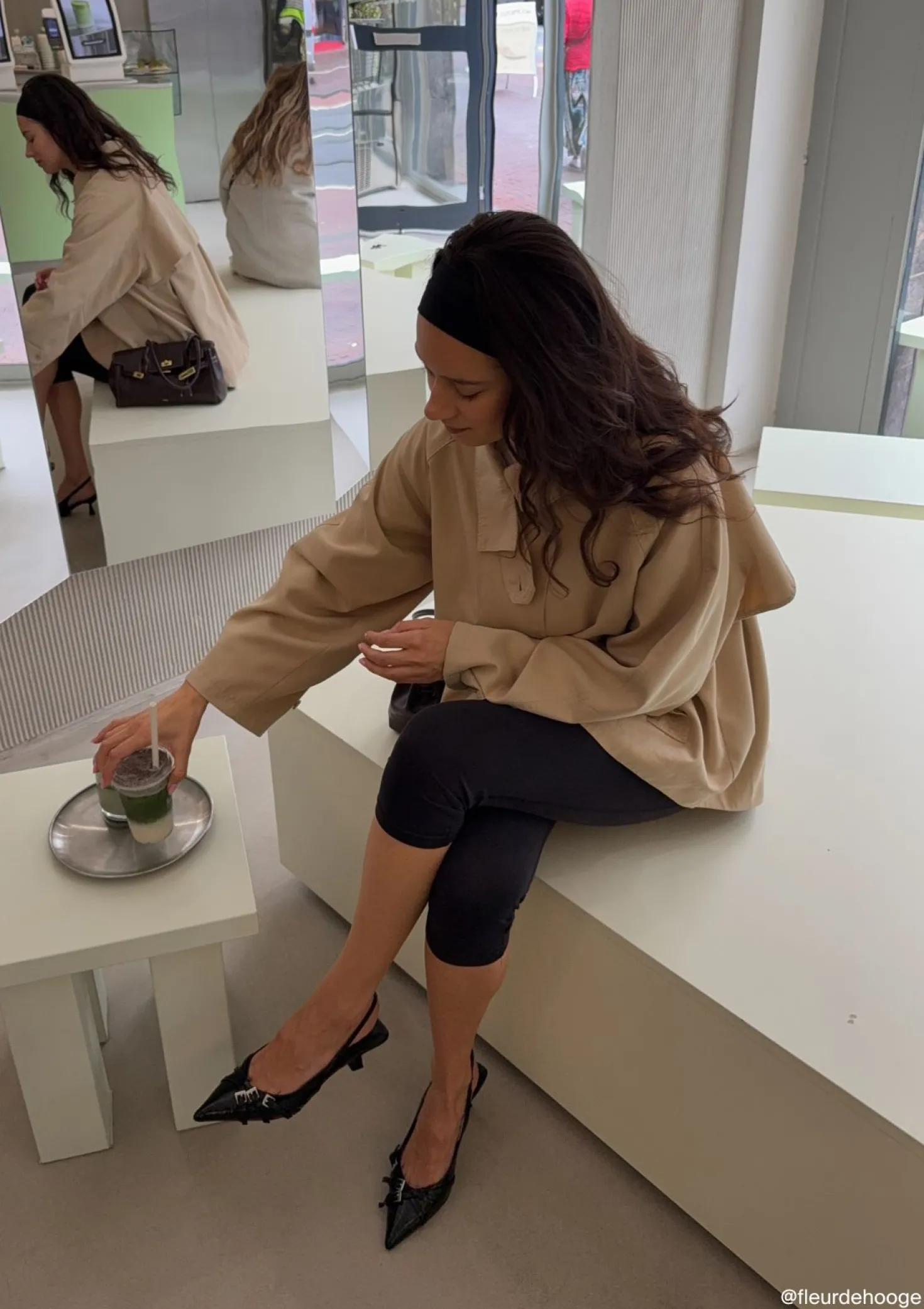 Zwarte slingback pumps met gespen