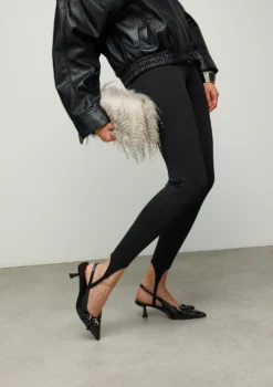 Zwarte slingback pumps met gespen