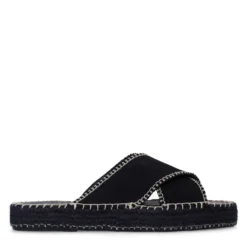 Zwarte suède slippers met witte stiksels