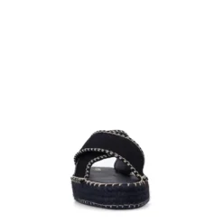 Zwarte suède slippers met witte stiksels